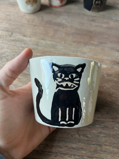 Kattenkopje kat met vis in bek #3